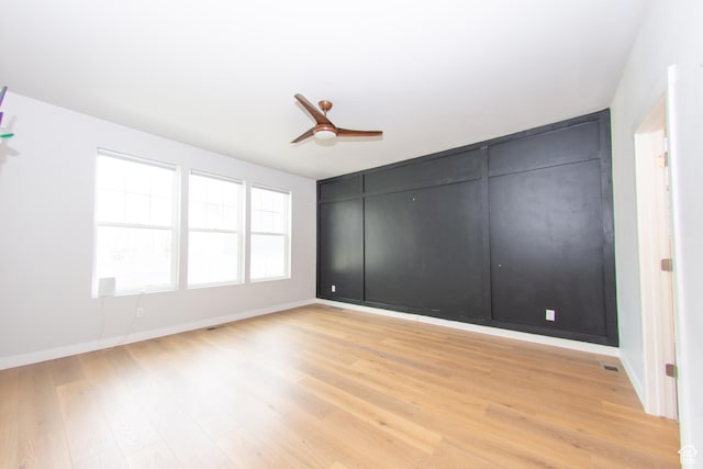 11511 S Pebble Pond Rd, South Jordan, UT 84009 - unfurnished room with light wood-style flooring and a ceiling fan