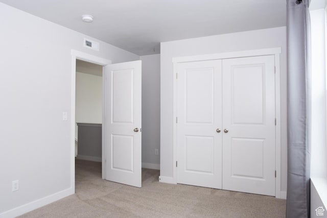11511 S Pebble Pond Rd, South Jordan, UT 84009 - unfurnished bedroom with light colored carpet and a closet