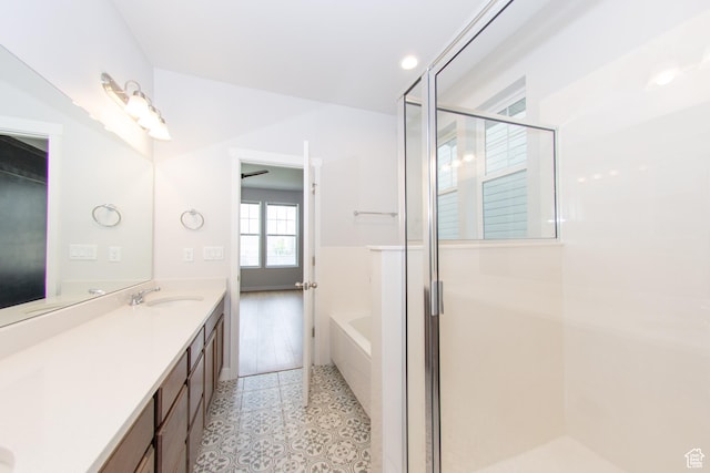 11511 S Pebble Pond Rd, South Jordan, UT 84009 - full bath featuring a stall shower, double vanity, a bath, and recessed lighting