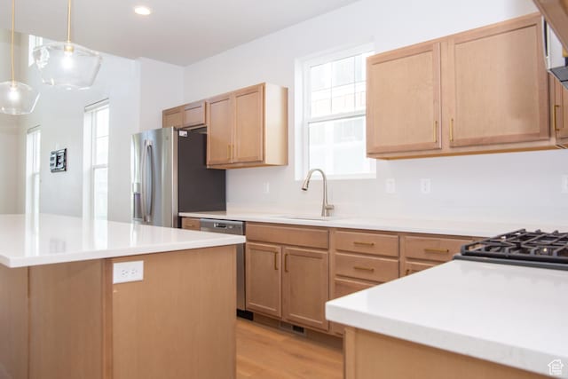 11511 S Pebble Pond Rd, South Jordan, UT 84009 - kitchen featuring stainless steel appliances, plenty of natural light, light countertops, decorative light fixtures, and recessed lighting