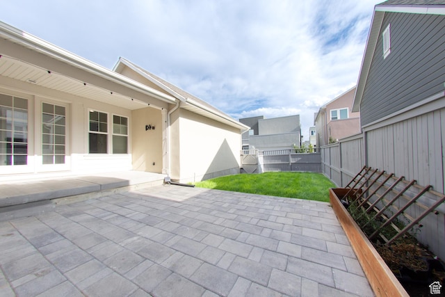 11511 S Pebble Pond Rd, South Jordan, UT 84009 - fenced backyard featuring a patio
