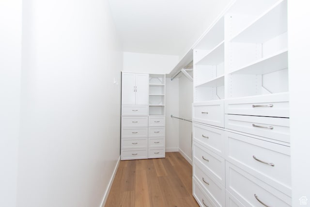 11511 S Pebble Pond Rd, South Jordan, UT 84009 - walk in closet featuring light wood finished floors