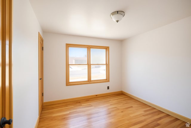 8646 W Florence Dr, Magna, UT 84044 - unfurnished room featuring light wood-style flooring