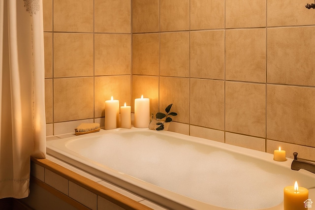 8646 W Florence Dr, Magna, UT 84044 - bathroom featuring a tub to relax in and tile walls