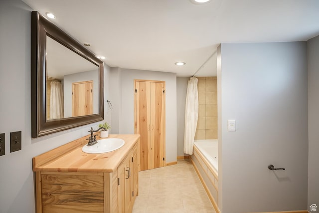 8646 W Florence Dr, Magna, UT 84044 - bathroom with vanity, tile patterned floors, recessed lighting, and shower / bath combo
