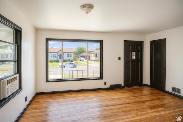 8646 W Florence Dr, Magna, UT 84044 - empty room featuring light wood-type flooring and baseboards