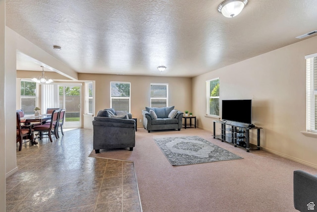 52 N 1100 W, Springville, UT 84663 - living area featuring a chandelier, healthy amount of natural light, and a textured ceiling