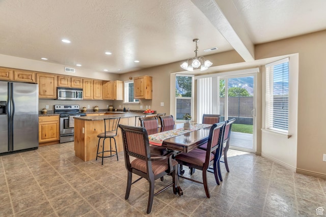 52 N 1100 W, Springville, UT 84663 - dining space with a chandelier, recessed lighting, and a textured ceiling