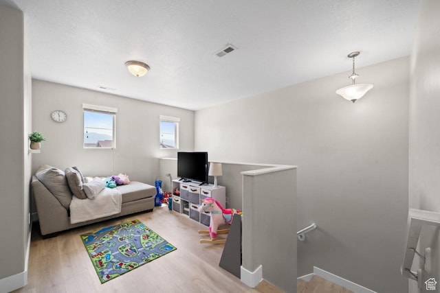 3634 S Creek Side Ln, Syracuse, UT 84075 - living room with wood finished floors and baseboards