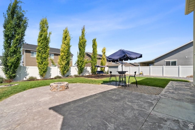 3634 S Creek Side Ln, Syracuse, UT 84075 - fenced backyard with an outdoor fire pit, a patio, outdoor dining area, and a residential view