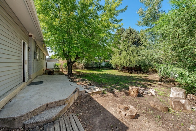 5726 S Highland Dr E, Holladay, UT 84121 - fenced backyard featuring a patio area