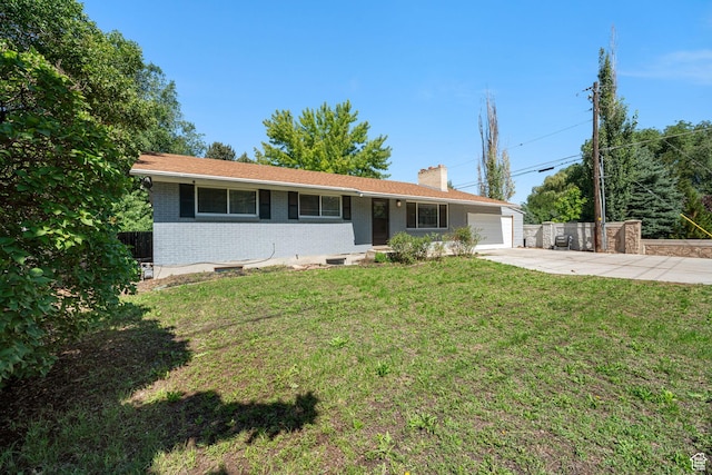 5726 S Highland Dr E, Holladay, UT 84121 - ranch-style house with a chimney, concrete driveway, brick siding, and a garage