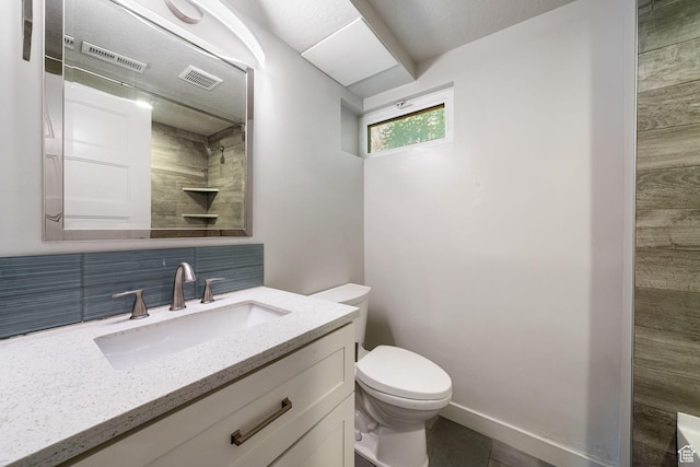 5726 S Highland Dr E, Holladay, UT 84121 - bathroom featuring vanity and decorative backsplash
