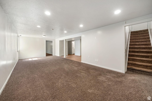5726 S Highland Dr E, Holladay, UT 84121 - carpeted spare room featuring stairs and recessed lighting