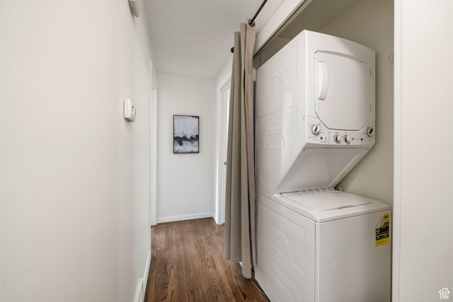 5726 S Highland Dr E, Holladay, UT 84121 - washroom featuring stacked washing machine and dryer and dark wood-type flooring