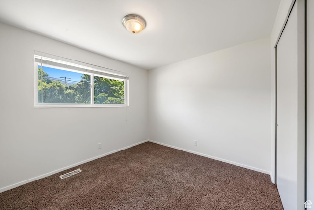 5726 S Highland Dr E, Holladay, UT 84121 - empty room featuring carpet and baseboards