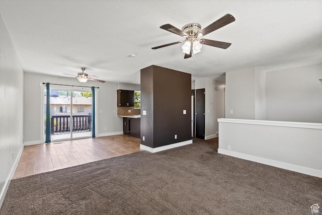 224 E 1950 S, Clearfield, UT 84015 - unfurnished living room with ceiling fan and carpet floors