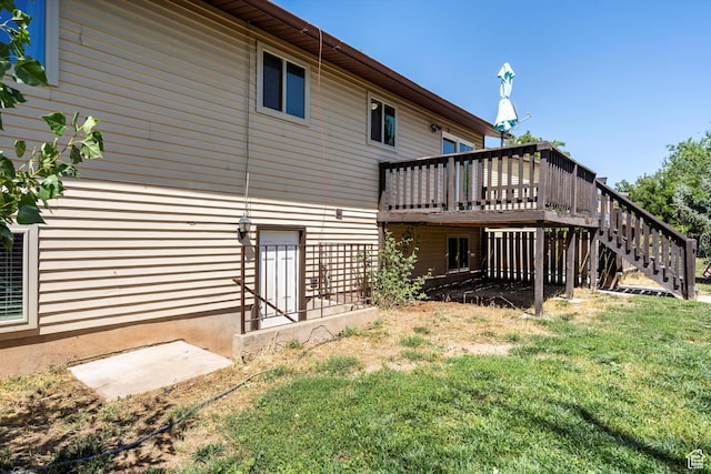 224 E 1950 S, Clearfield, UT 84015 - rear view of house featuring a wooden deck, stairs, and a yard