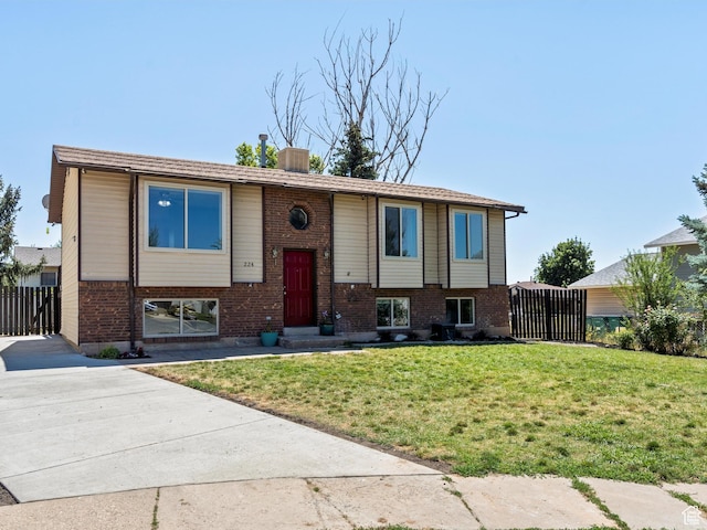 224 E 1950 S, Clearfield, UT 84015 - split foyer home with brick siding, a chimney, and concrete driveway