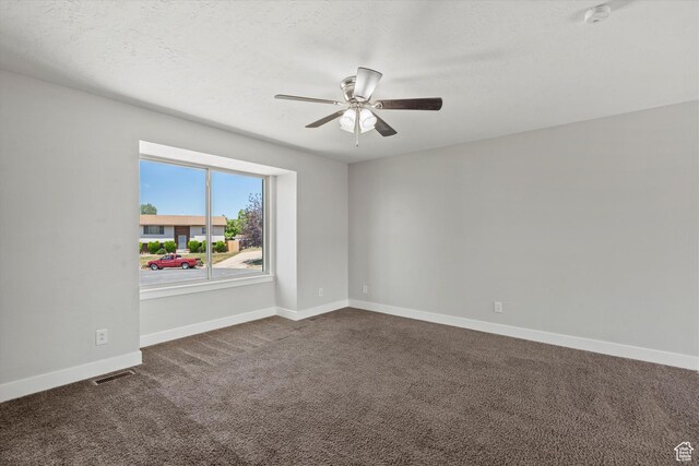 224 E 1950 S, Clearfield, UT 84015 - unfurnished room with ceiling fan, dark colored carpet, and a smoke detector