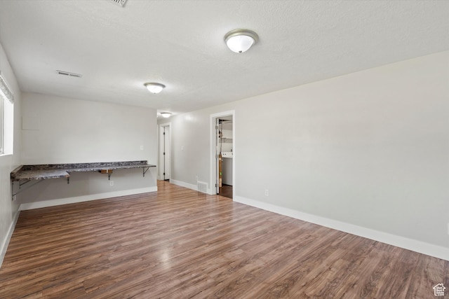 224 E 1950 S, Clearfield, UT 84015 - spare room featuring wood finished floors and a textured ceiling