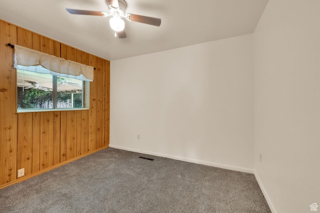 640 E 300 N, Pleasant Grove, UT 84062 - unfurnished room featuring wooden walls, carpet flooring, and ceiling fan