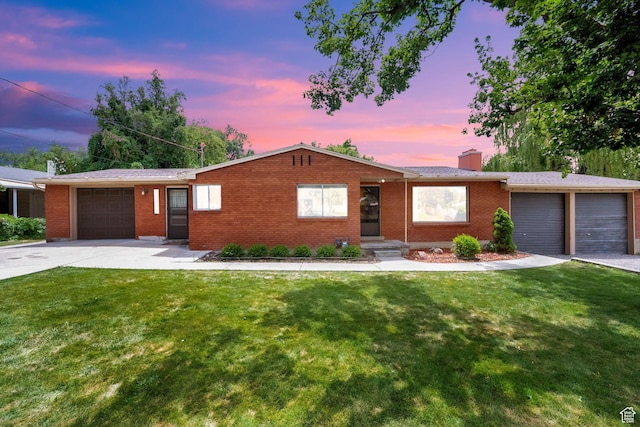 640 E 300 N, Pleasant Grove, UT 84062 - ranch-style house featuring a garage, a chimney, driveway, and brick siding