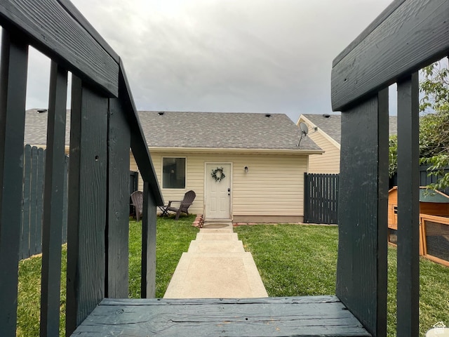 4518 Silver Spur Way, Eagle Mountain, UT 84005 - doorway to property with a shingled roof
