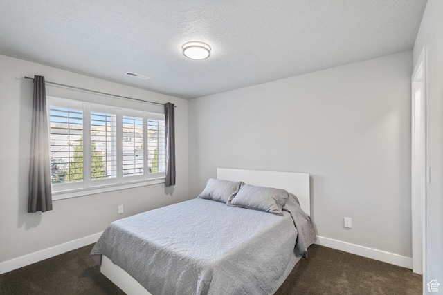 7672 N Evans Ranch Dr E, Eagle Mountain, UT 84005 - bedroom featuring carpet floors and a textured ceiling