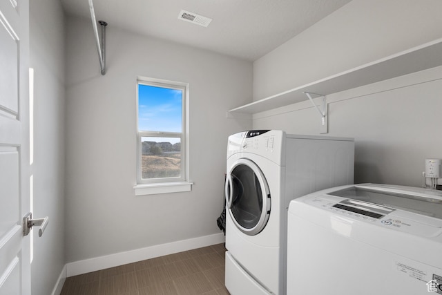 7672 N Evans Ranch Dr E, Eagle Mountain, UT 84005 - laundry area with independent washer and dryer and baseboards
