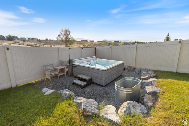 7672 N Evans Ranch Dr E, Eagle Mountain, UT 84005 - fenced backyard featuring a hot tub