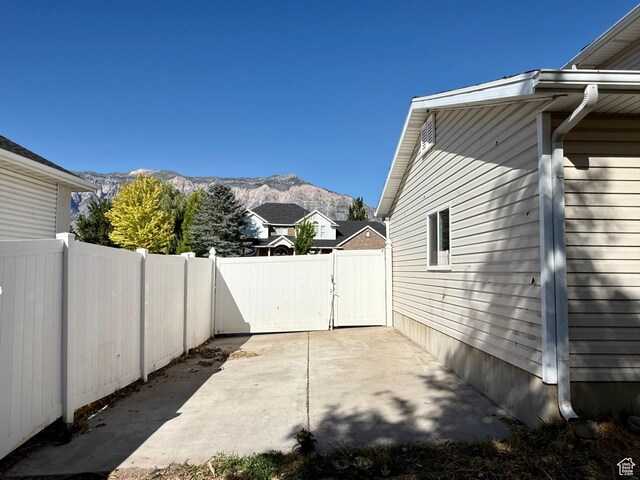 2573 W Remuda Dr, Farr West, UT 84404 - view of patio / terrace with a mountain view