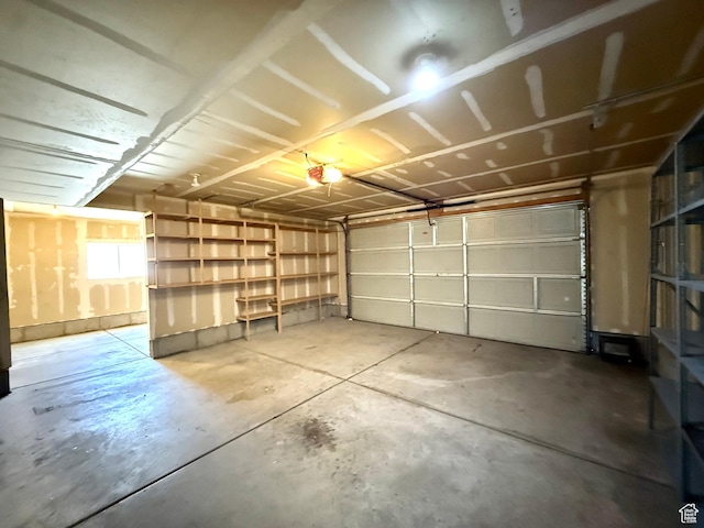 2573 W Remuda Dr, Farr West, UT 84404 - garage featuring a garage door opener