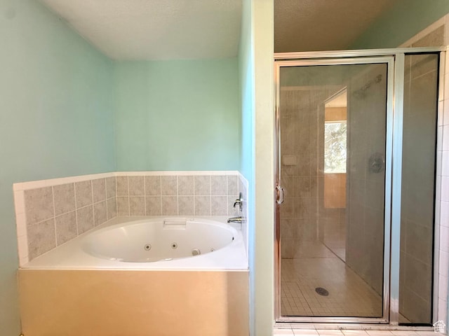 2573 W Remuda Dr, Farr West, UT 84404 - bathroom featuring a tub with jets and a shower stall