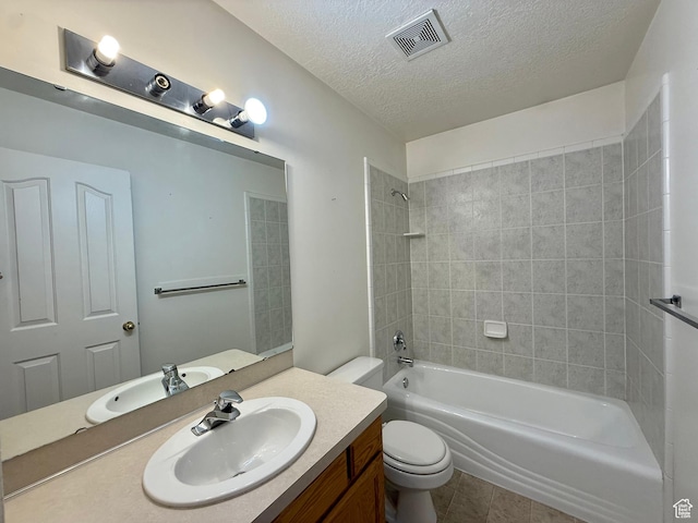 2573 W Remuda Dr, Farr West, UT 84404 - bathroom with vanity, a textured ceiling, shower / washtub combination, and tile patterned flooring