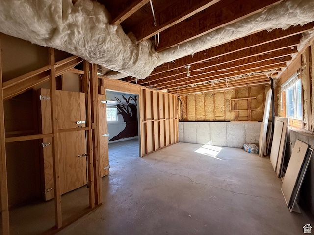 2573 W Remuda Dr, Farr West, UT 84404 - misc room featuring plenty of natural light and concrete floors