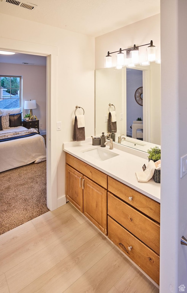 257 N 900 W, Provo, UT 84601 - ensuite bathroom featuring vanity and wood finished floors