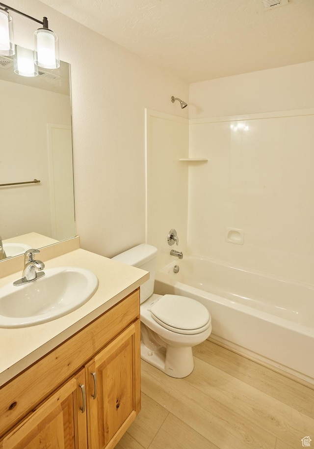 257 N 900 W, Provo, UT 84601 - bathroom featuring vanity, wood finished floors, and bathing tub / shower combination