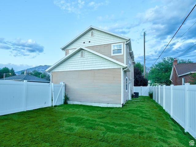 257 N 900 W, Provo, UT 84601 - view of property exterior featuring a fenced backyard and a central AC unit