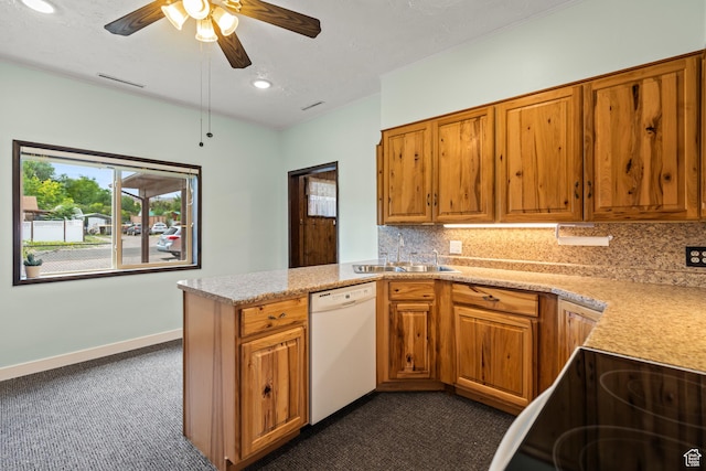 407 E 200 N, Richfield, UT 84701 - kitchen with dishwasher, dark carpet, brown cabinetry, and recessed lighting