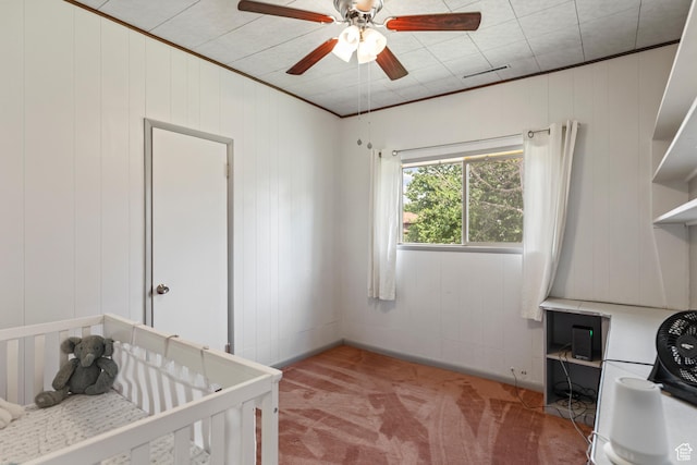407 E 200 N, Richfield, UT 84701 - bedroom with light colored carpet, ceiling fan, and a nursery area