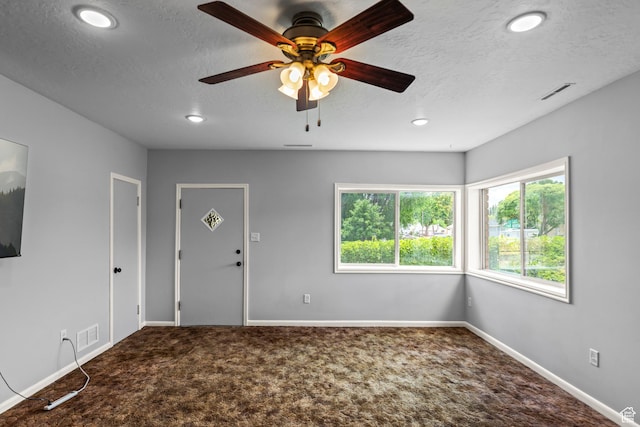 407 E 200 N, Richfield, UT 84701 - unfurnished room with carpet floors, a textured ceiling, ceiling fan, and recessed lighting