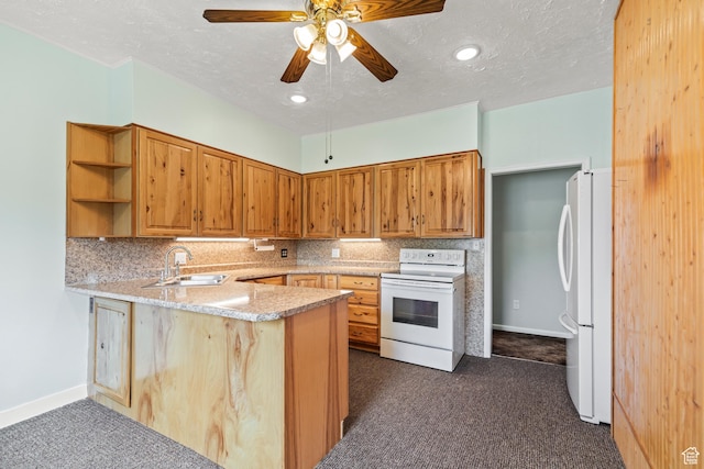 407 E 200 N, Richfield, UT 84701 - kitchen with white appliances, dark colored carpet, a peninsula, backsplash, and a textured ceiling