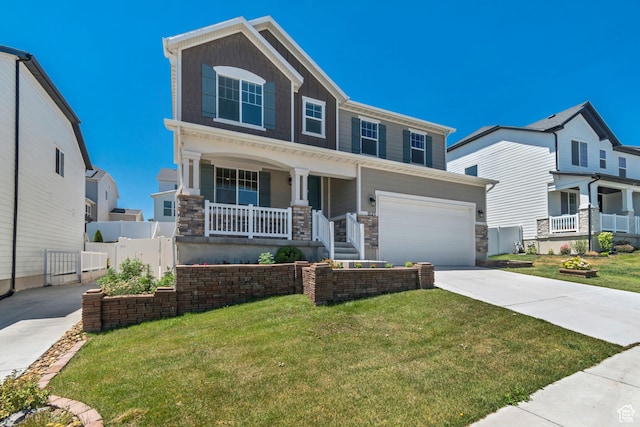 2123 N Wallflower Dr, Saratoga Springs, UT 84045 - view of front of property with stone siding, a porch, concrete driveway, and an attached garage