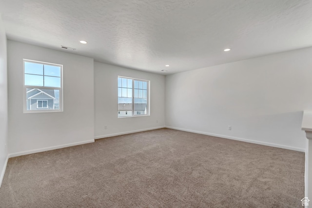 2123 N Wallflower Dr, Saratoga Springs, UT 84045 - carpeted empty room with recessed lighting and a textured ceiling