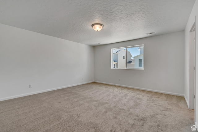 2123 N Wallflower Dr, Saratoga Springs, UT 84045 - carpeted empty room with baseboards and a textured ceiling