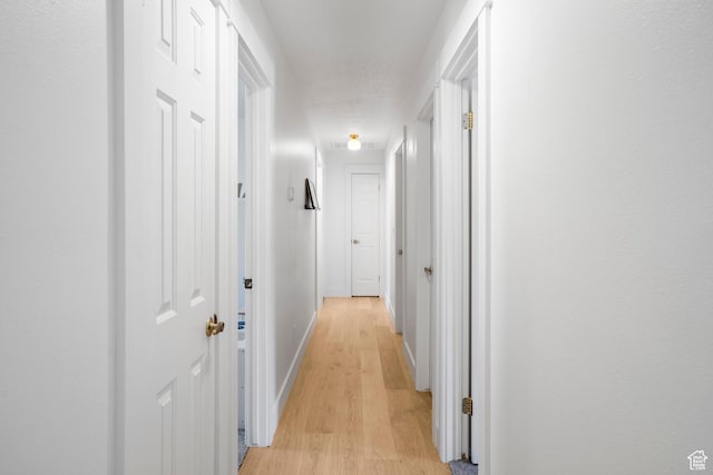 1655 Maplewood Way, St George, UT 84790 - hallway featuring light wood-style floors and baseboards