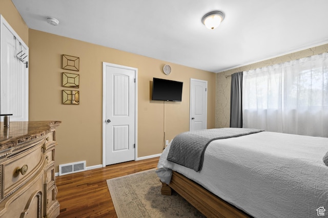 1770 E Vine St S, Salt Lake City, UT 84121 - bedroom with dark wood-style floors and baseboards
