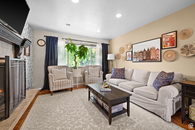 1770 E Vine St S, Salt Lake City, UT 84121 - living room featuring a large fireplace, wood finished floors, and recessed lighting