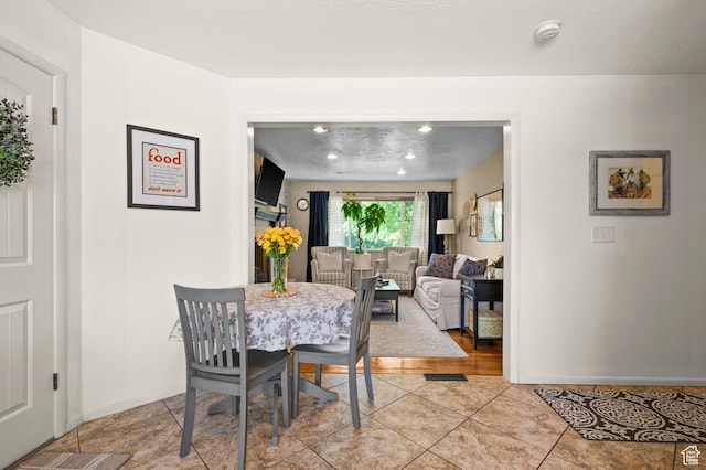 1770 E Vine St S, Salt Lake City, UT 84121 - dining area featuring baseboards and light tile patterned floors